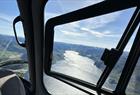 Utsikt over Hardangerfjorden fra et helikopter